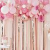 Ballonnenboog met decoratie roze en rose goud